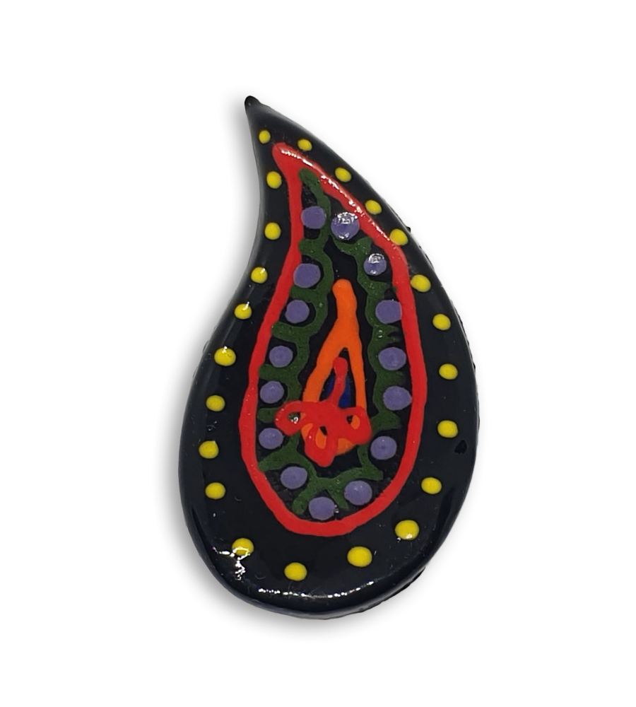 A hand-painted black teardrop boteh boho motif ceramic mosaic insert with red, yellow, green and purple detailing.