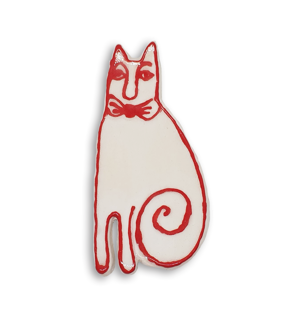 A hand-painted white and red cat ceramic mosaic insert.