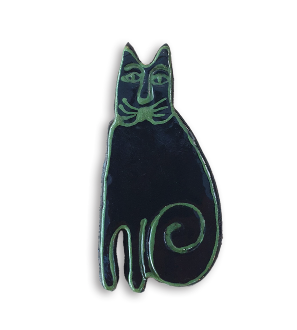 A hand-painted black and green cat ceramic mosaic insert.