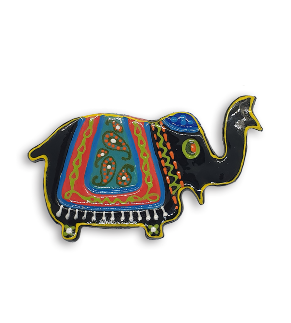 A black hand-painted Indian elephant ceramic mosaic insert with a yellow rim and green eyes.