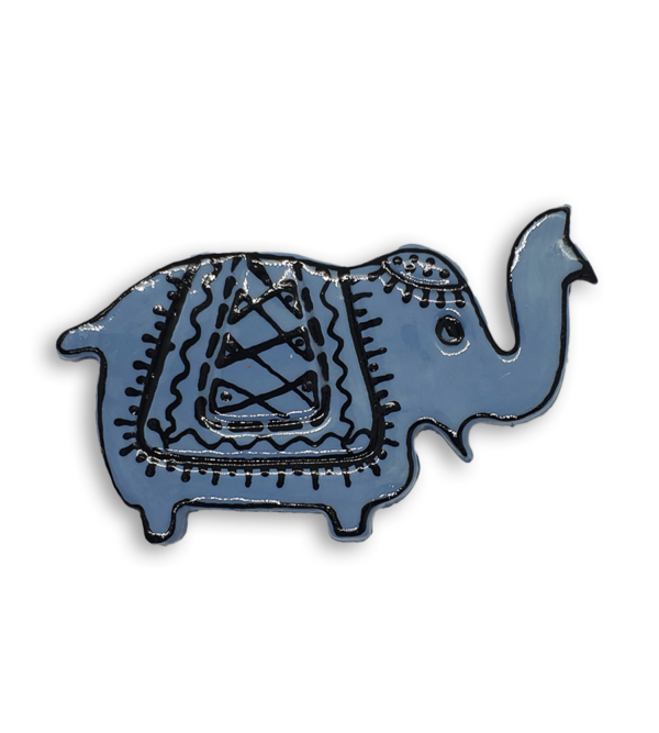 A blue Indian elephant ceramic mosaic insert with hand-painted black designs.