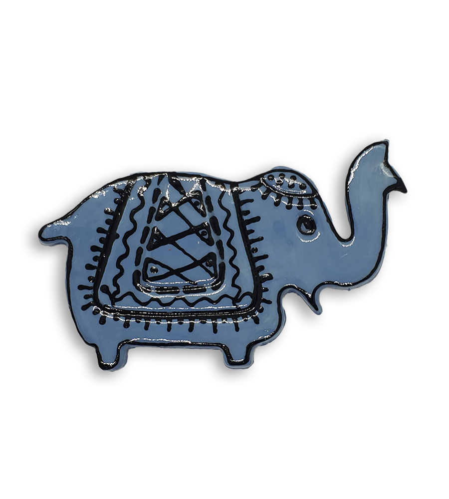 A blue Indian elephant ceramic mosaic insert with hand-painted black designs.