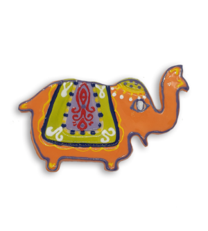 An orange Indian elephant ceramic mosaic insert with hand-painted purple designs.