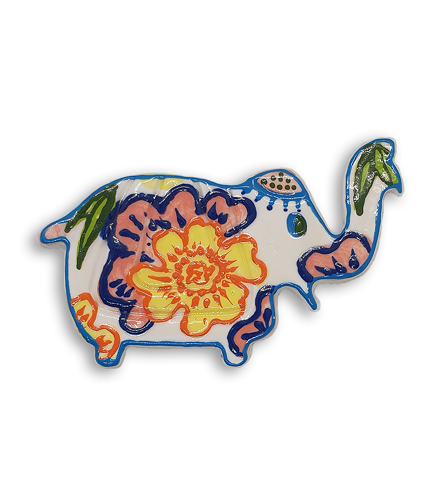 A white hand-painted Indian elephant ceramic mosaic insert with pink and yellow floral patterns.