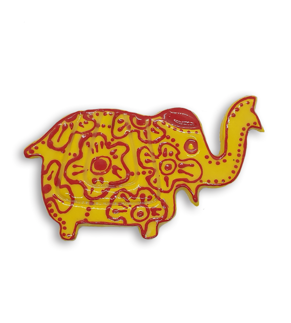 A yellow Indian elephant ceramic mosaic insert with hand-painted red designs.