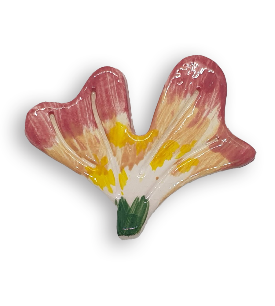 A hand-painted flower petal ceramic mosaic insert with green, yellow, pink and cream colours.