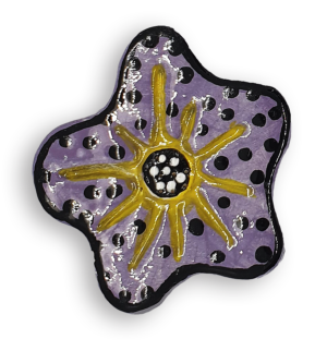 A hand-painted purple anemone ceramic mosaic insert with black spots and a yellow starburst design.