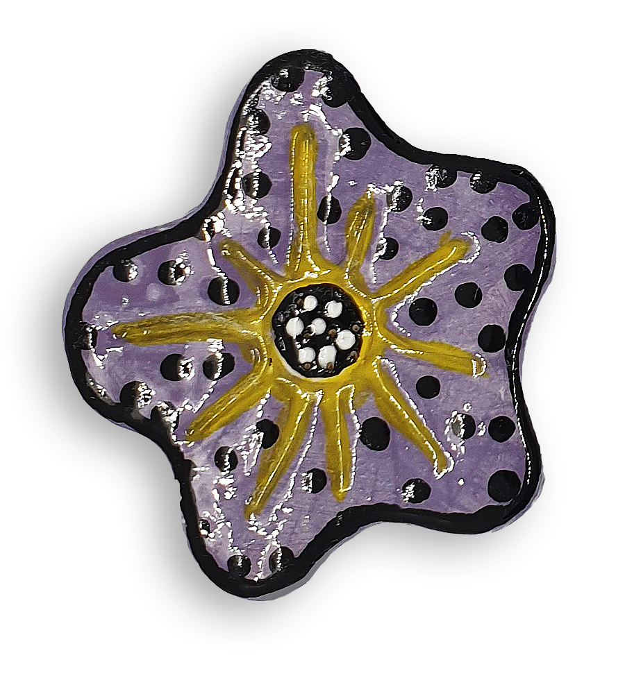 A hand-painted purple anemone ceramic mosaic insert with black spots and a yellow starburst design.