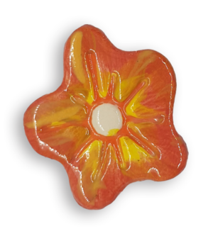 A hand-painted orange and yellow anemone ceramic mosaic insert.