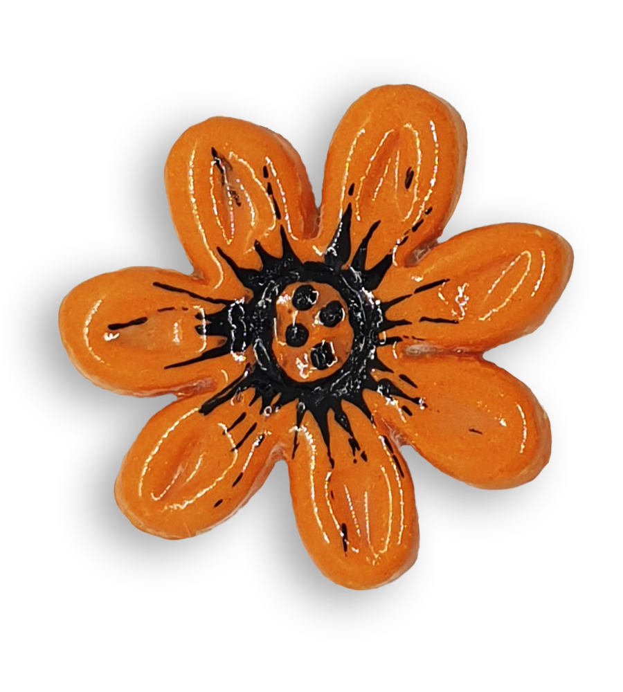 A bright orange daisy flower ceramic mosaic insert with hand-painted black details.
