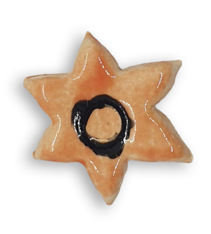 A light orange star ceramic mosaic insert.