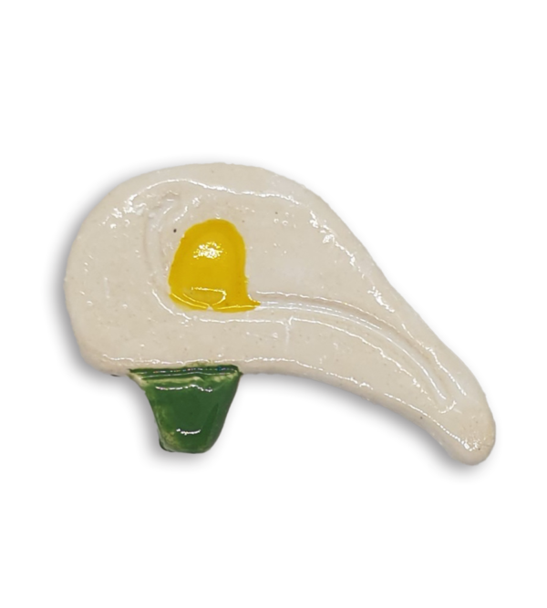 Side view of a white arum flower or calla lily ceramic mosaic insert.