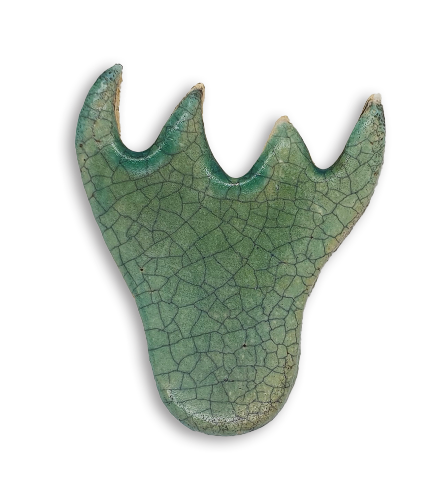 A pale green bellflower ceramic mosaic insert with a crackle effect design.