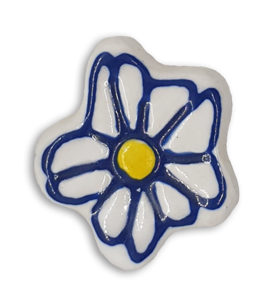 A hand-painted white and blue anemone ceramic mosaic insert.
