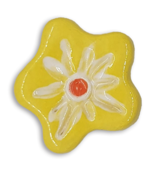 A hand-painted yellow anemone ceramic mosaic insert with orange and white details.