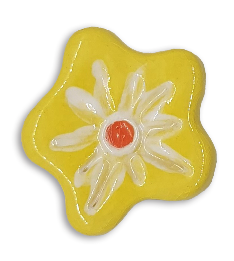 A hand-painted yellow anemone ceramic mosaic insert with orange and white details.