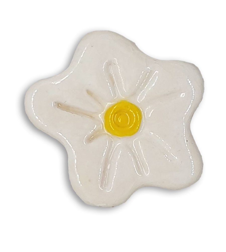 A simple white hand-painted anemone ceramic mosaic insert with a yellow centre.