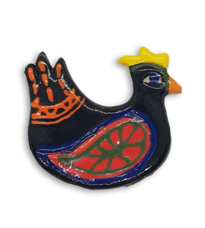 A hand-painted black hen ceramic mosaic insert with red wings.