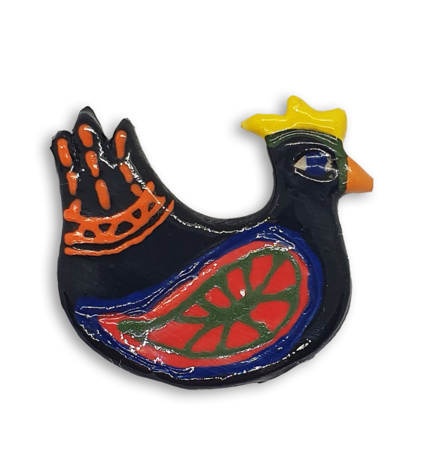 A hand-painted black hen ceramic mosaic insert with red wings.