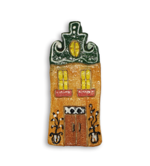 A hand-painted Dutch house ceramic mosaic insert with a green gabled roof.