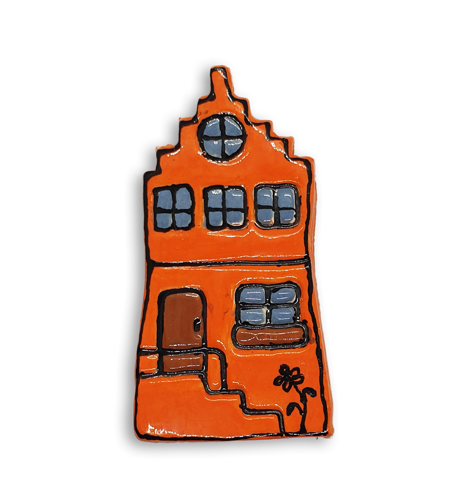 A hand-painted orange house ceramic mosaic insert with a rose window.