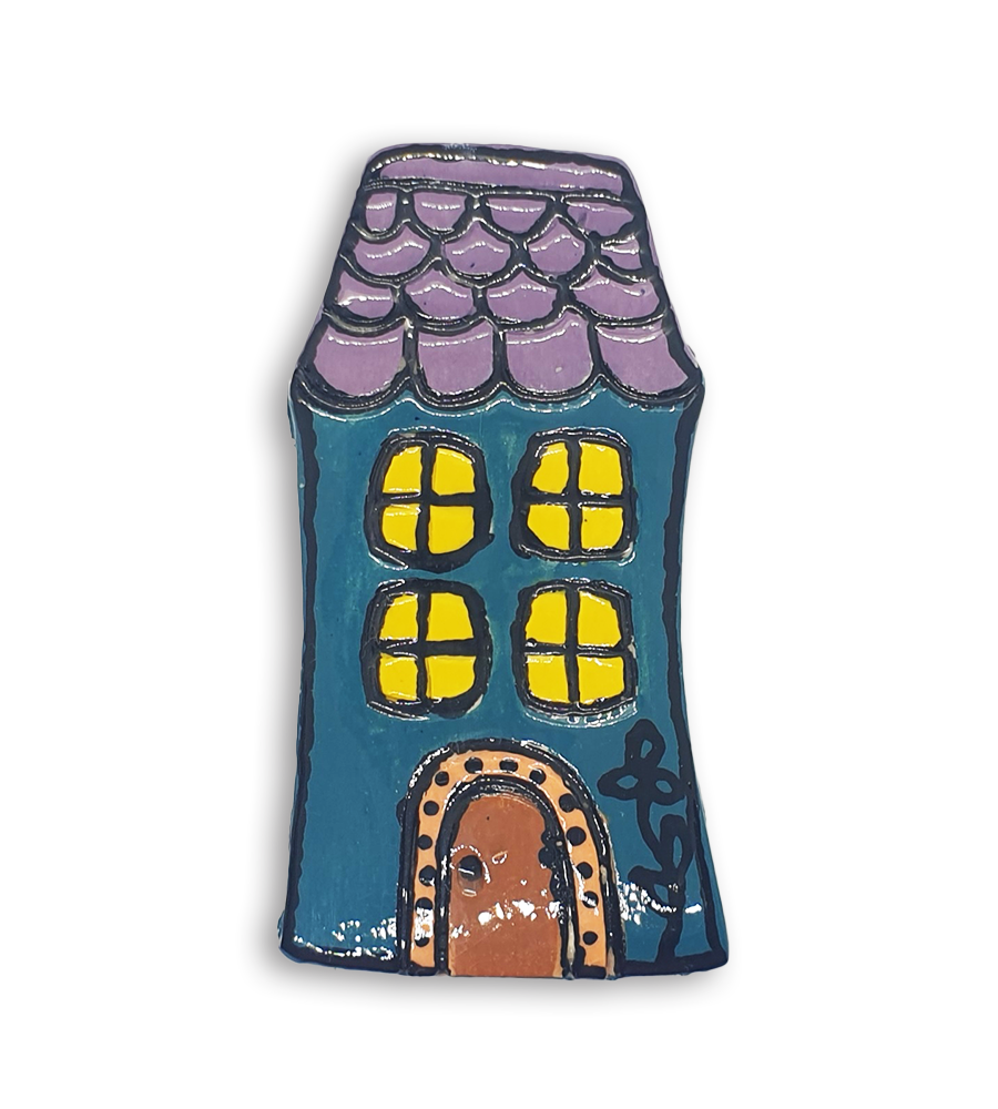 A hand-painted light blue English cottage house ceramic mosaic insert with purple roof shingles design.
