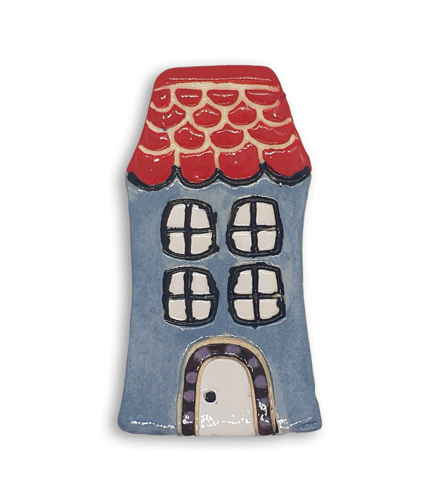 A hand-painted light blue English cottage house ceramic mosaic insert with red roof shingles design.