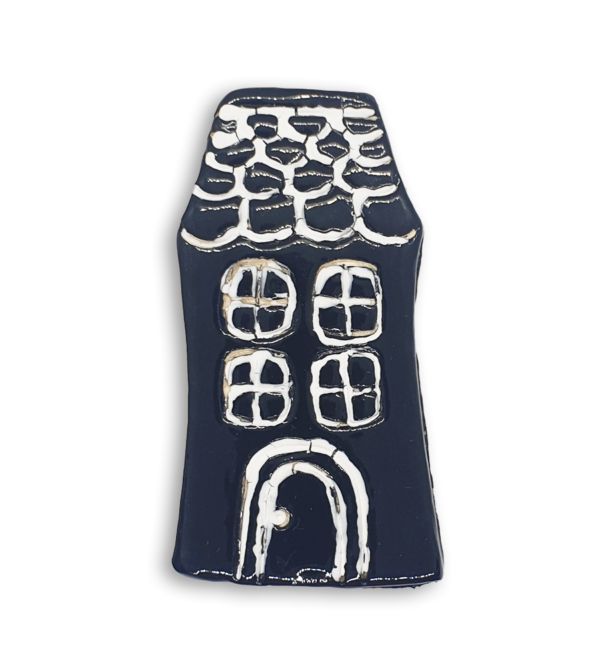 A hand-painted black or dark blue English cottage house ceramic mosaic insert with roof shingles design.