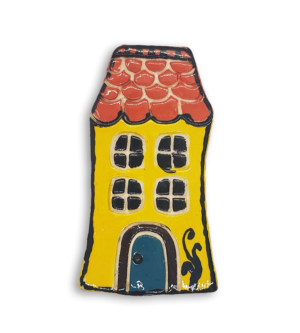 A hand-painted yellow English cottage house ceramic mosaic insert with red roof shingles design and a blue door.