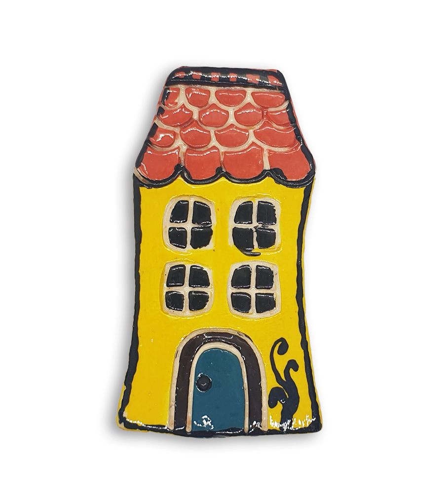 A hand-painted yellow English cottage house ceramic mosaic insert with red roof shingles design and a blue door.