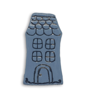 A hand-painted light blue English cottage house ceramic mosaic insert with roof shingles design.