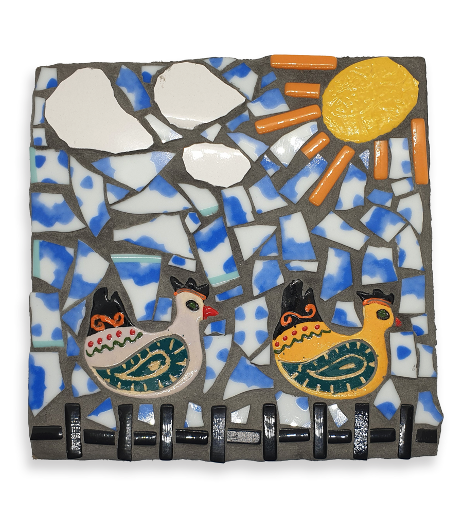 A mosaic depicting two hen ceramic inserts under a sunny sky.