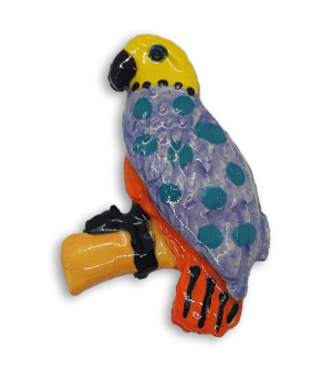 A hand-painted parrot ceramic mosaic insert with a yellow head and purple wings.