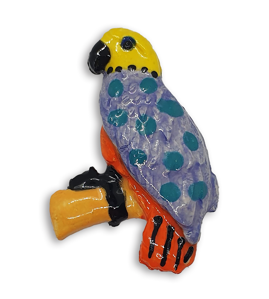 A hand-painted parrot ceramic mosaic insert with a yellow head and purple wings.