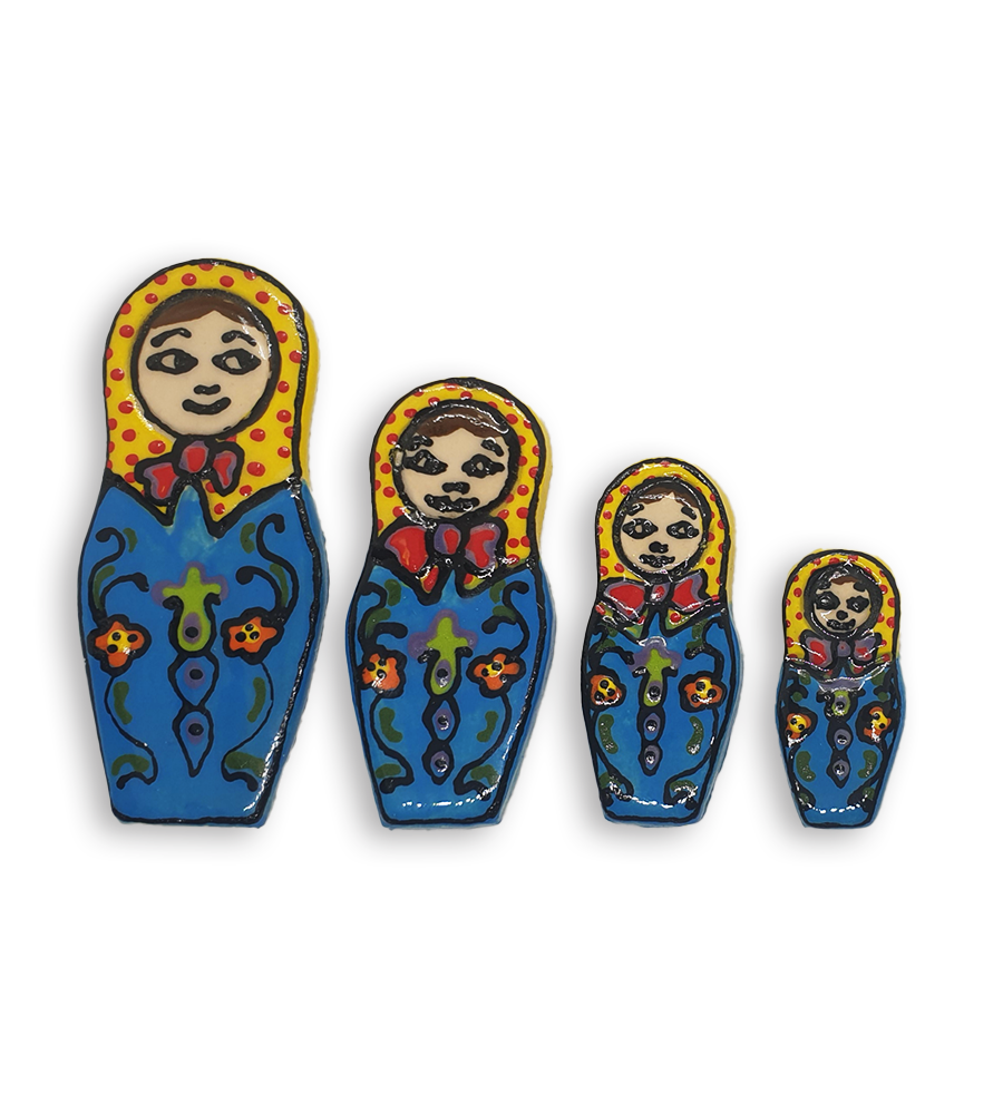 A set of four hand-painted Russian Doll ceramic mosaic inserts with blue dresses, yellow headscarves spotted with red and bright red neck bows.