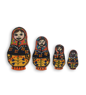 A set of three hand-painted Russian Doll ceramic mosaic inserts with black and yellow dresses and orange headscarves.