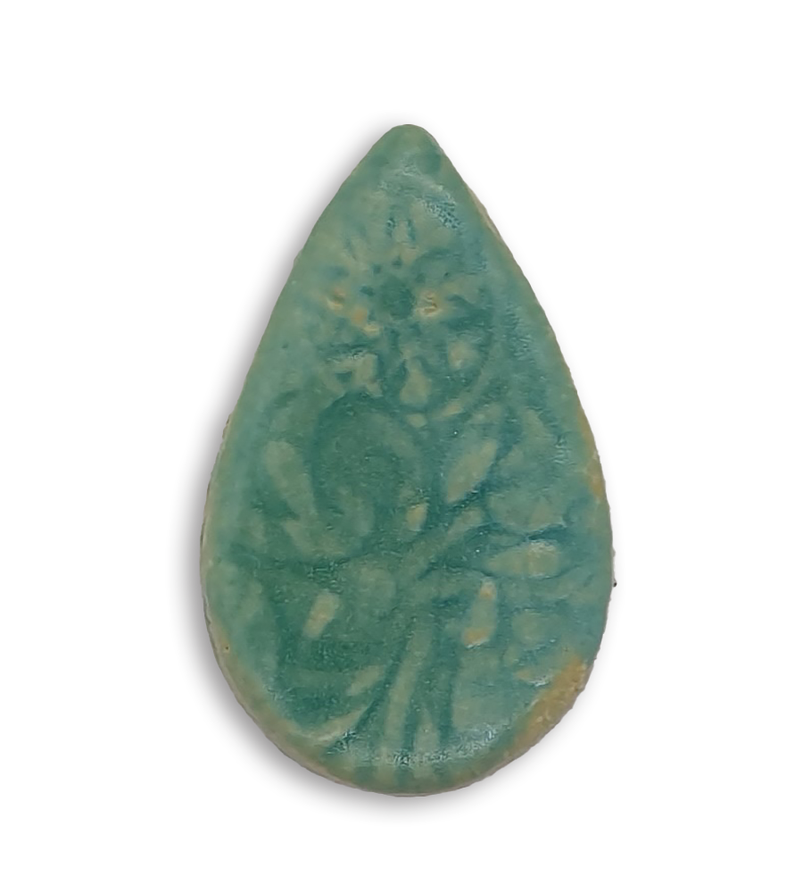A pale greenish blue teardrop ceramic mosaic insert with a textured design.