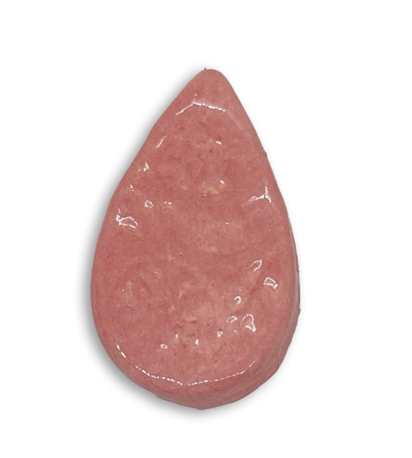 A light pink teardrop ceramic mosaic insert with a textured design.