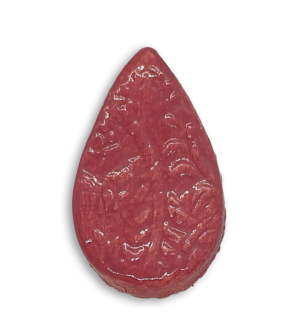 A dark pink teardrop ceramic mosaic insert with a textured design.