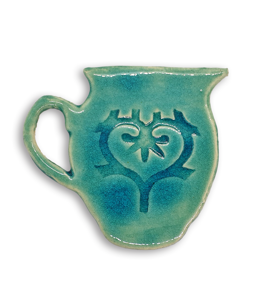 A hand-painted aqua jug ceramic mosaic insert with a swirling heart design.