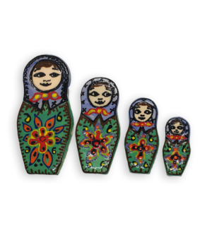 A set of four hand-painted Russian Doll ceramic mosaic inserts with green dresses and purple headscarves, and brown edging.