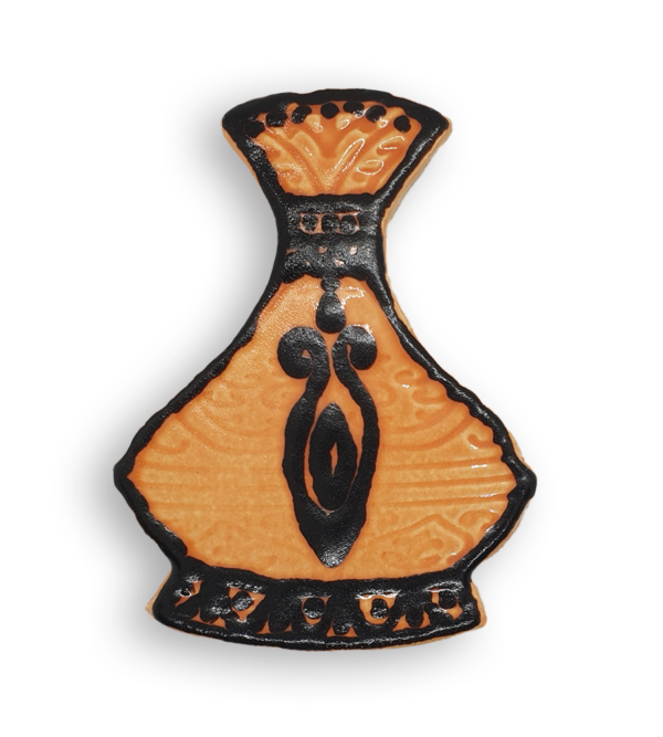 A hand-painted black and amber vase ceramic mosaic insert.