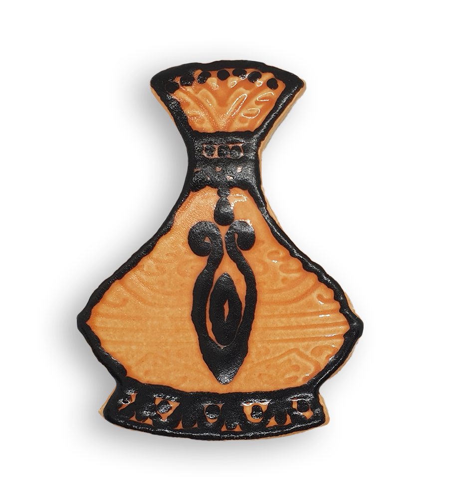 A hand-painted black and amber vase ceramic mosaic insert.