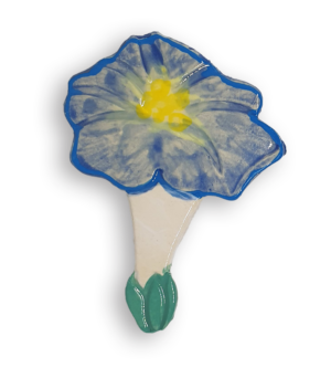 A ceramic mosaic insert in the shape of a pale blue Morning Glory flower.