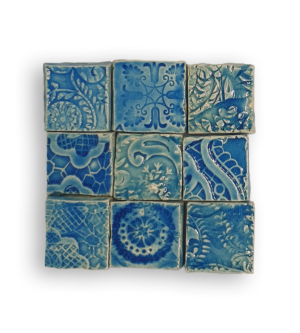 A collection of nine textured square tiles in blue.