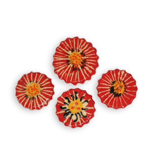 Four ceramic mosaic inserts in the shapes of bright red flowers.